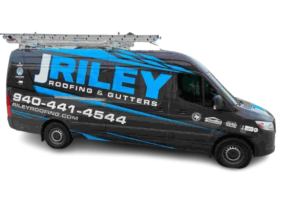J. Riley Roofing & Gutters service van with company logo and contact info.
